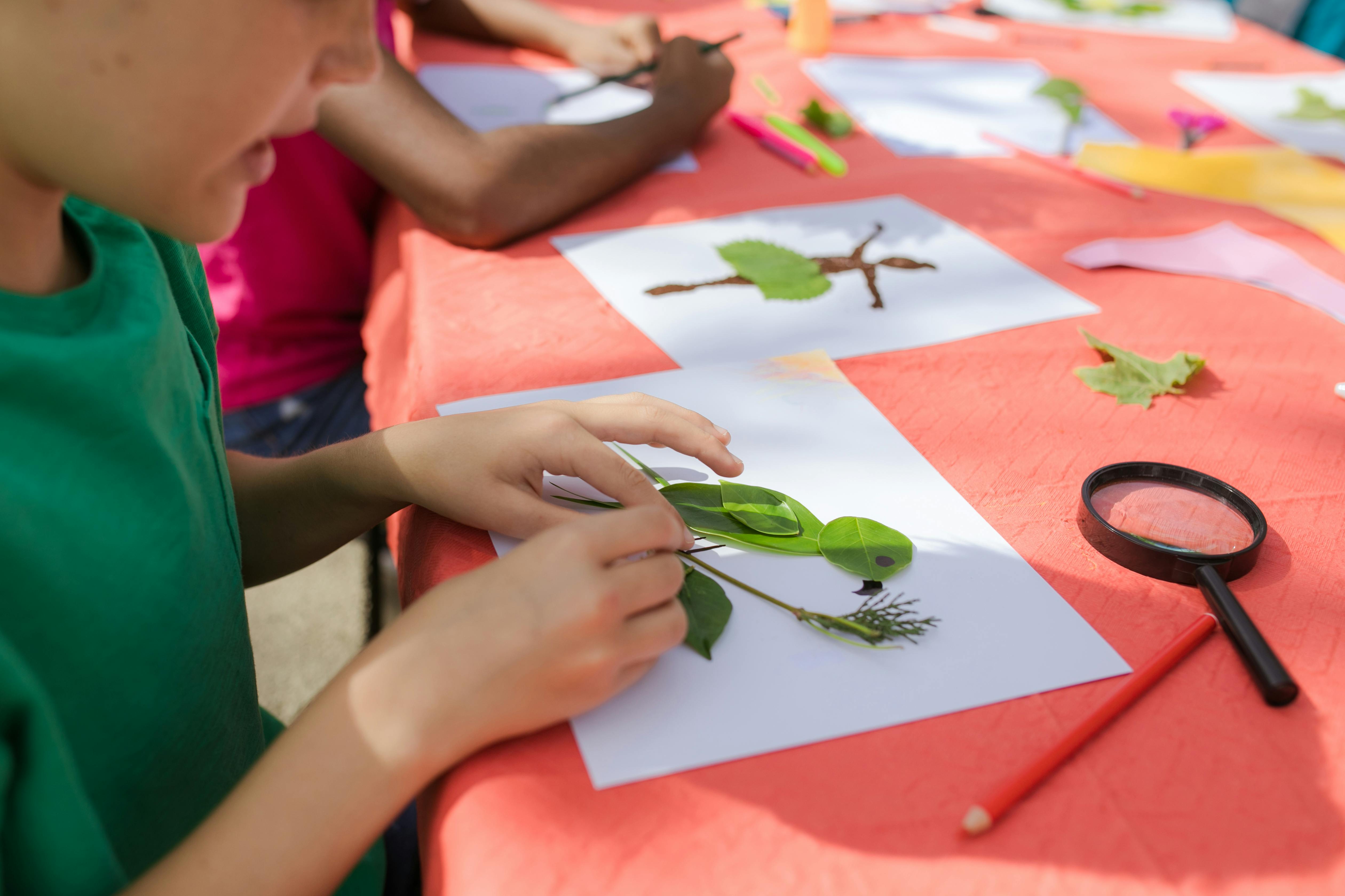 Young children collaborating on a hands-on building project at a small group center